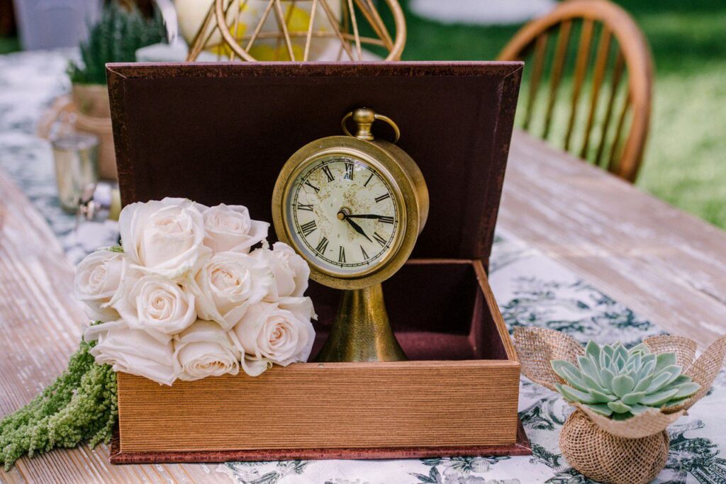 clock box & white flowers